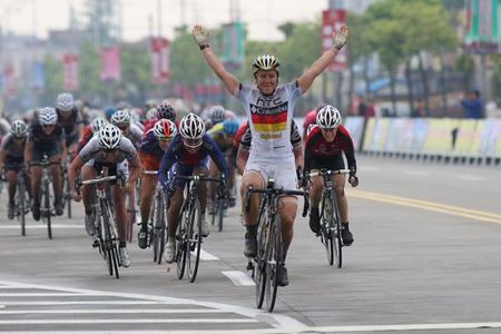Ina Yoko Teutenberg (HTC - Columbia Women) celebrates winning the first stage of the Tour of Chongming Island, ahead of Kirsten Wild (Cervelo Test Team) and Kyeong Hye Choi (South Korea). Rochelle Gilmore (Australia) was fourth