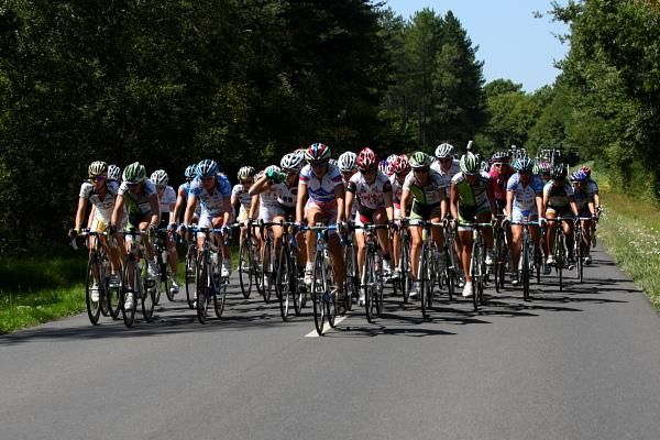 The bunch rolled along on the mainly straight, wooded roads which constituted stage three.