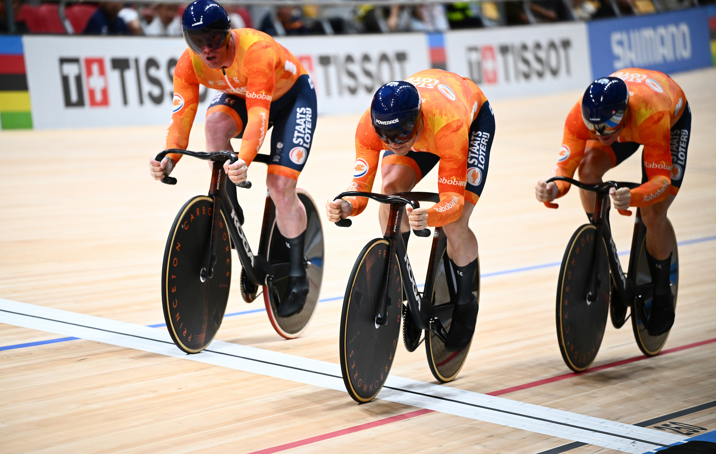 Jeffrey Hoogland, Harrie Lavreysen, and Roy van den Berg (Netherlands) racing on the track during the men's team sprint