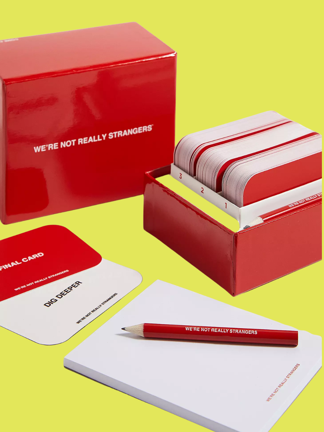 A game card set with a paper pad and pencil