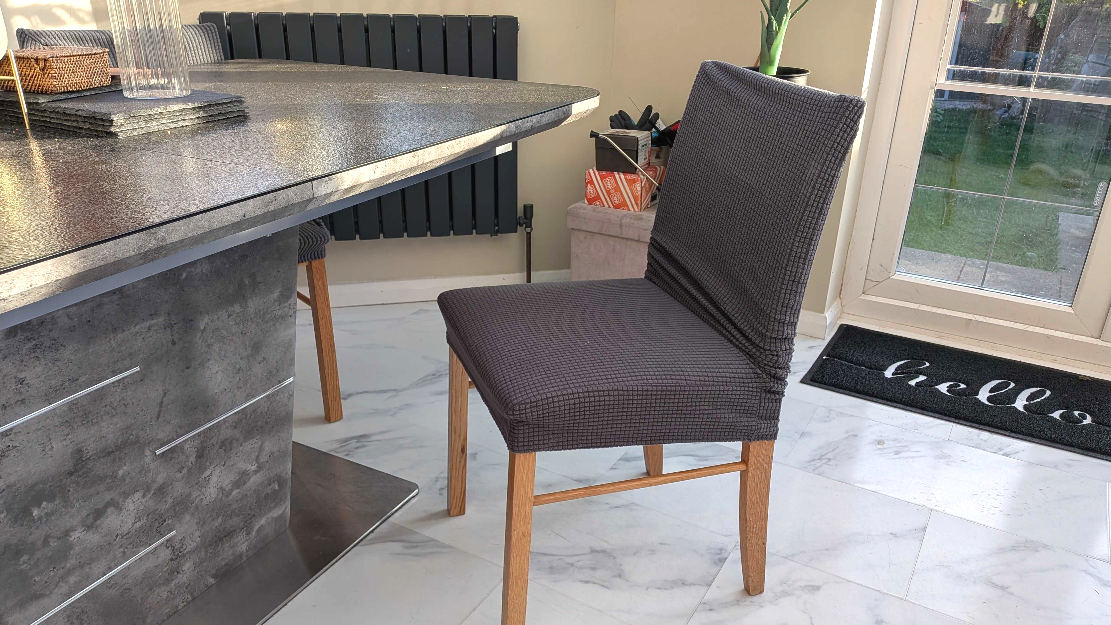 Chair with dark grey slipcover
