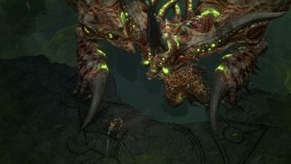 Belial, a massive archdemon, looms over the player in a Diablo 4 bossfight.
