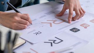 A person doing exercises before designing a logo