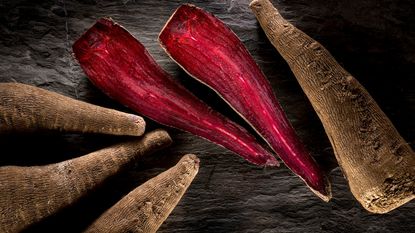 crapaudine beetroots, one sliced open to show bright red inside 