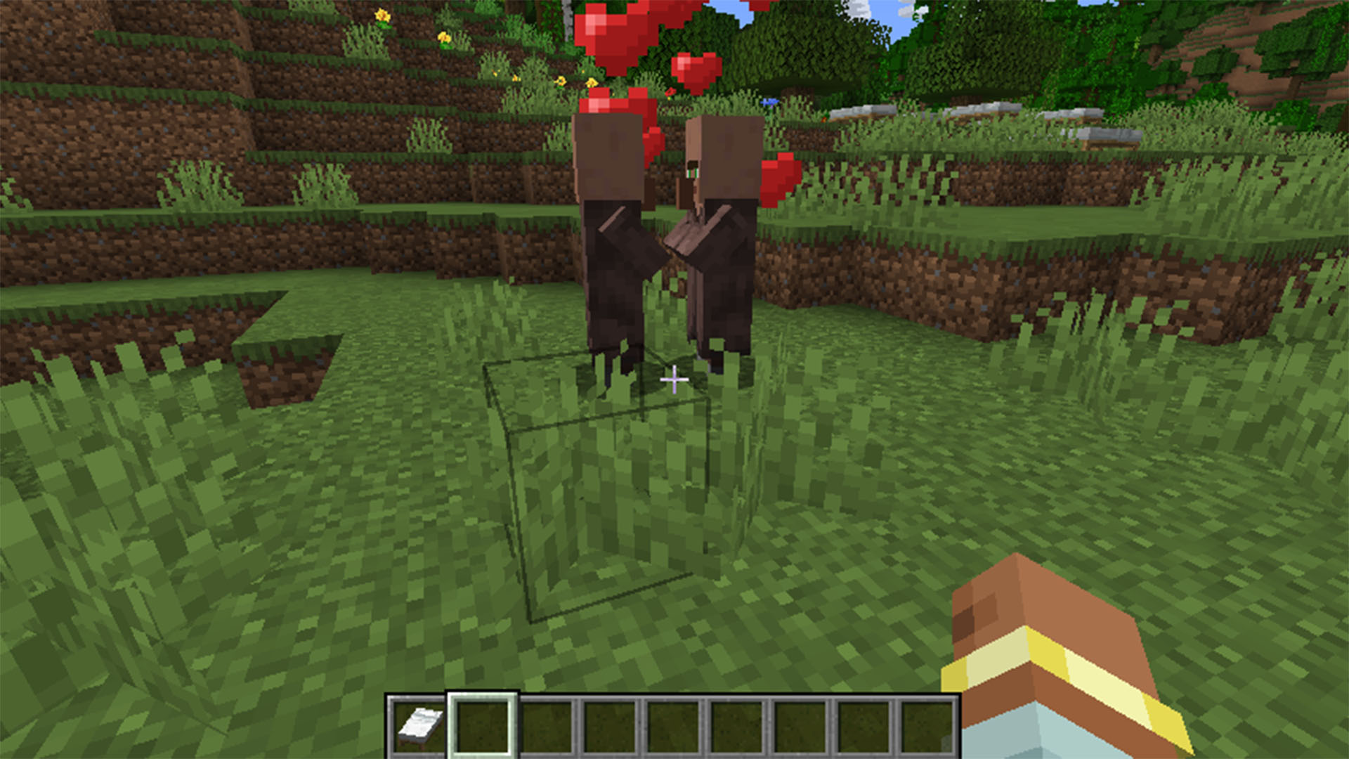 Two villagers about to breed in Minecraft.