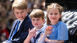 Prince George of Cambridge, Prince Louis of Cambridge and Princess Charlotte of Cambridge ride in a carriage during Trooping The Colour, the Queen's annual birthday parade, on June 02, 2022 in London, England