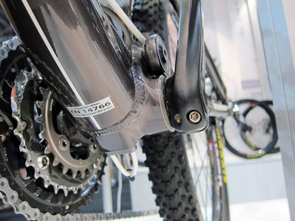 The internally routed cables exit at the base of the down tube.