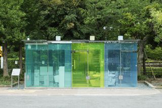 shigeru ban designed tokyo toilet in blue and green transparencies