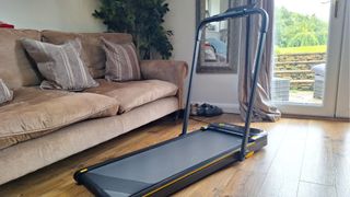 Strol 2E treadmill with handlebars setup in living room