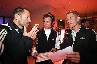 Mario Kummer (l), Bas Giling and Brian Holm (r) talk in Vienna