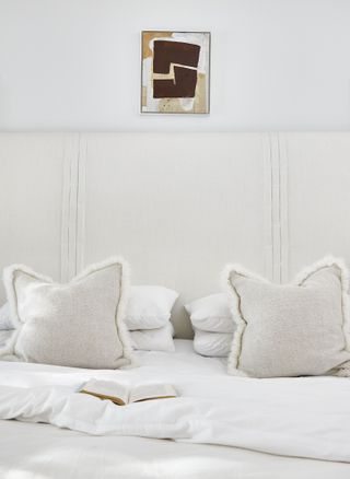 White bedroom with small print