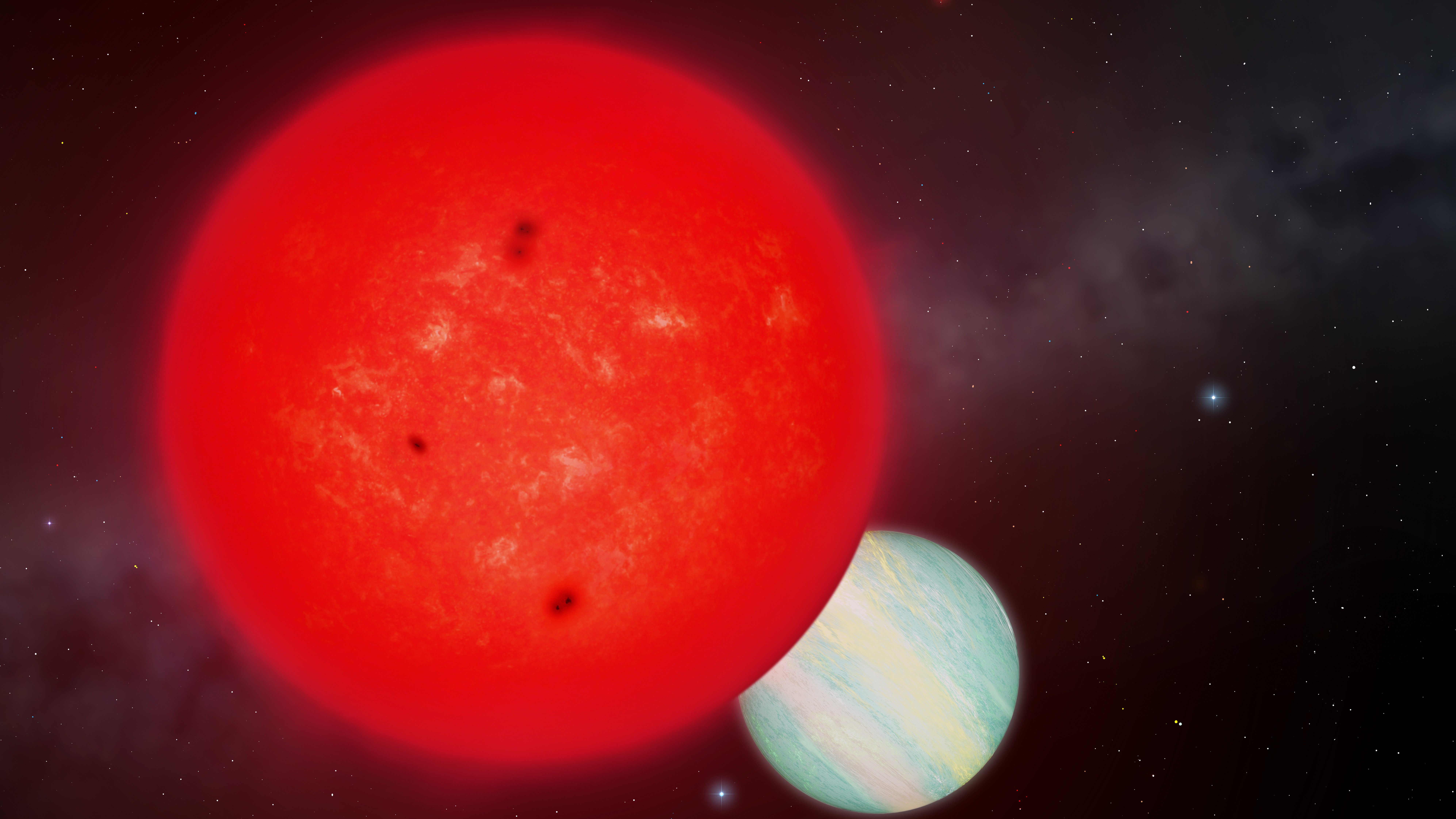 A red orb in front of a pale blue one.