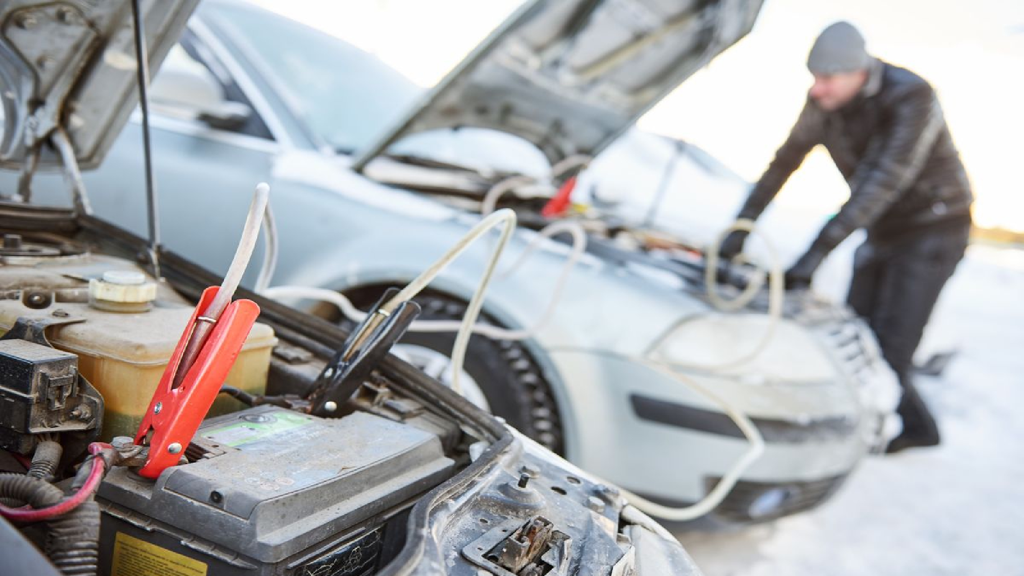Shutterstock jump starting a car