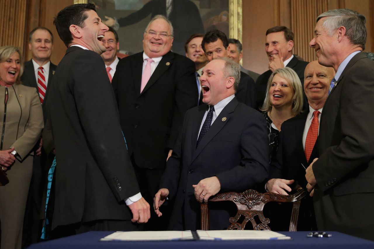 Paul Ryan laughs.