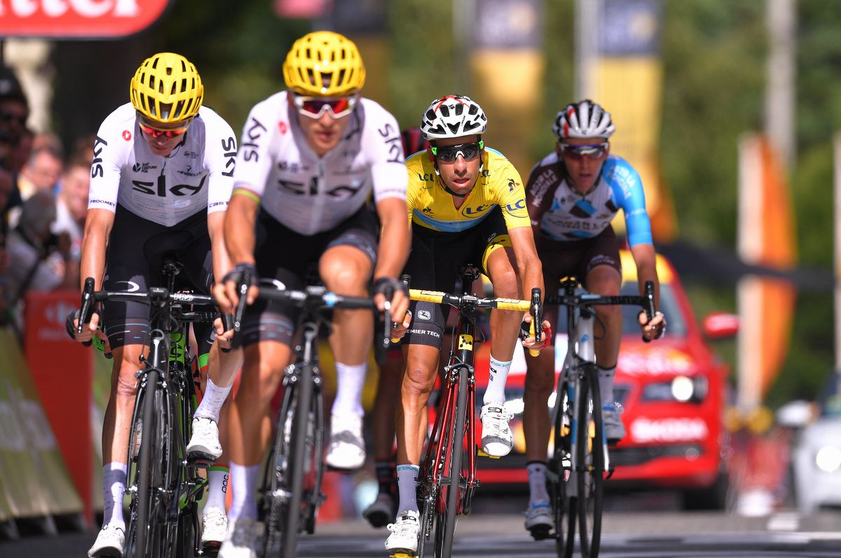 Michal Kwiatkowski leading Chris Froome over the line into Foix