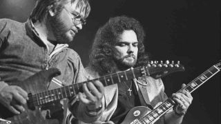 Lynyrd Skynyrd’s Ed King and Gary Rossington performing onstage in 1987