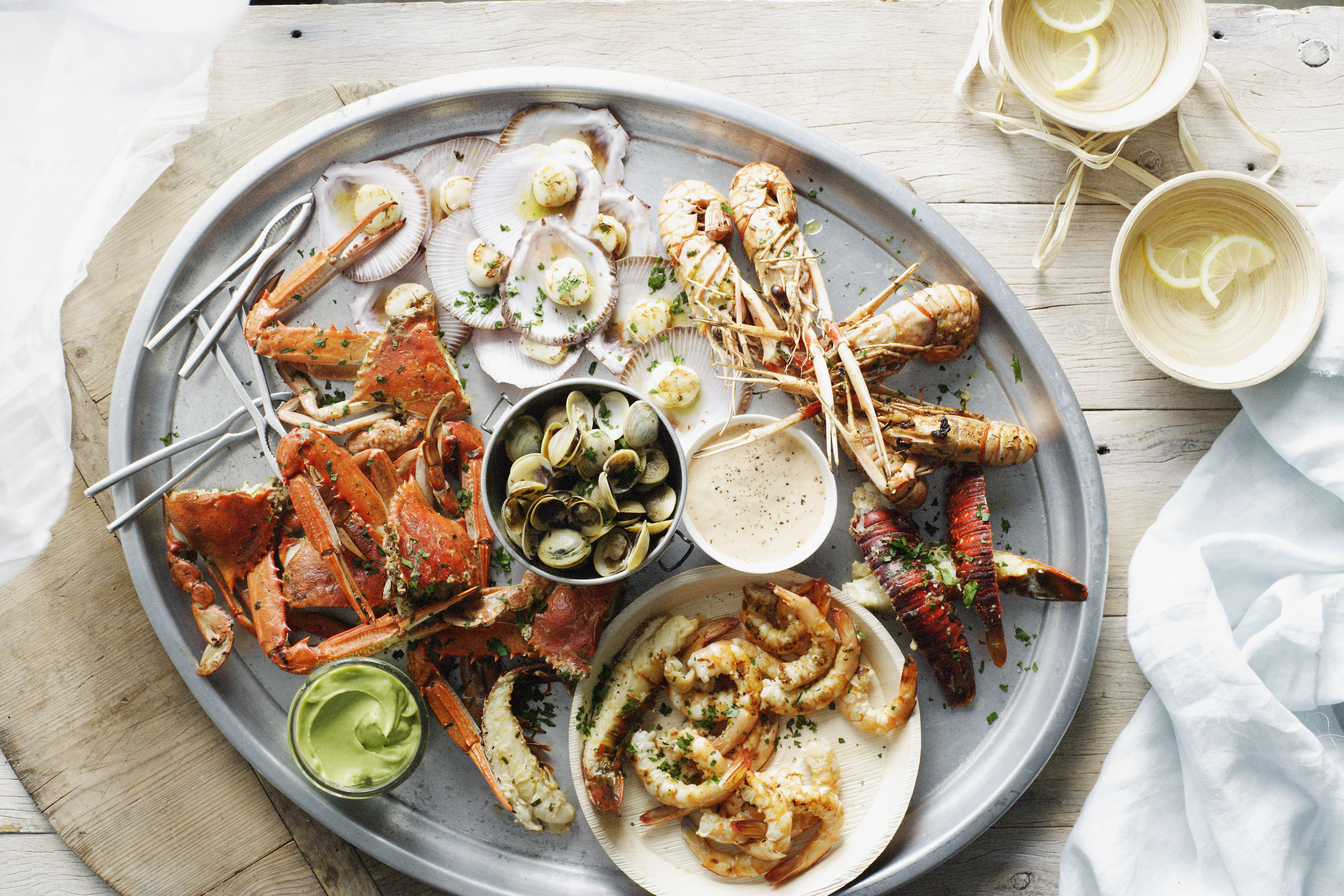 Seafood platter on an oval dish photographed from above