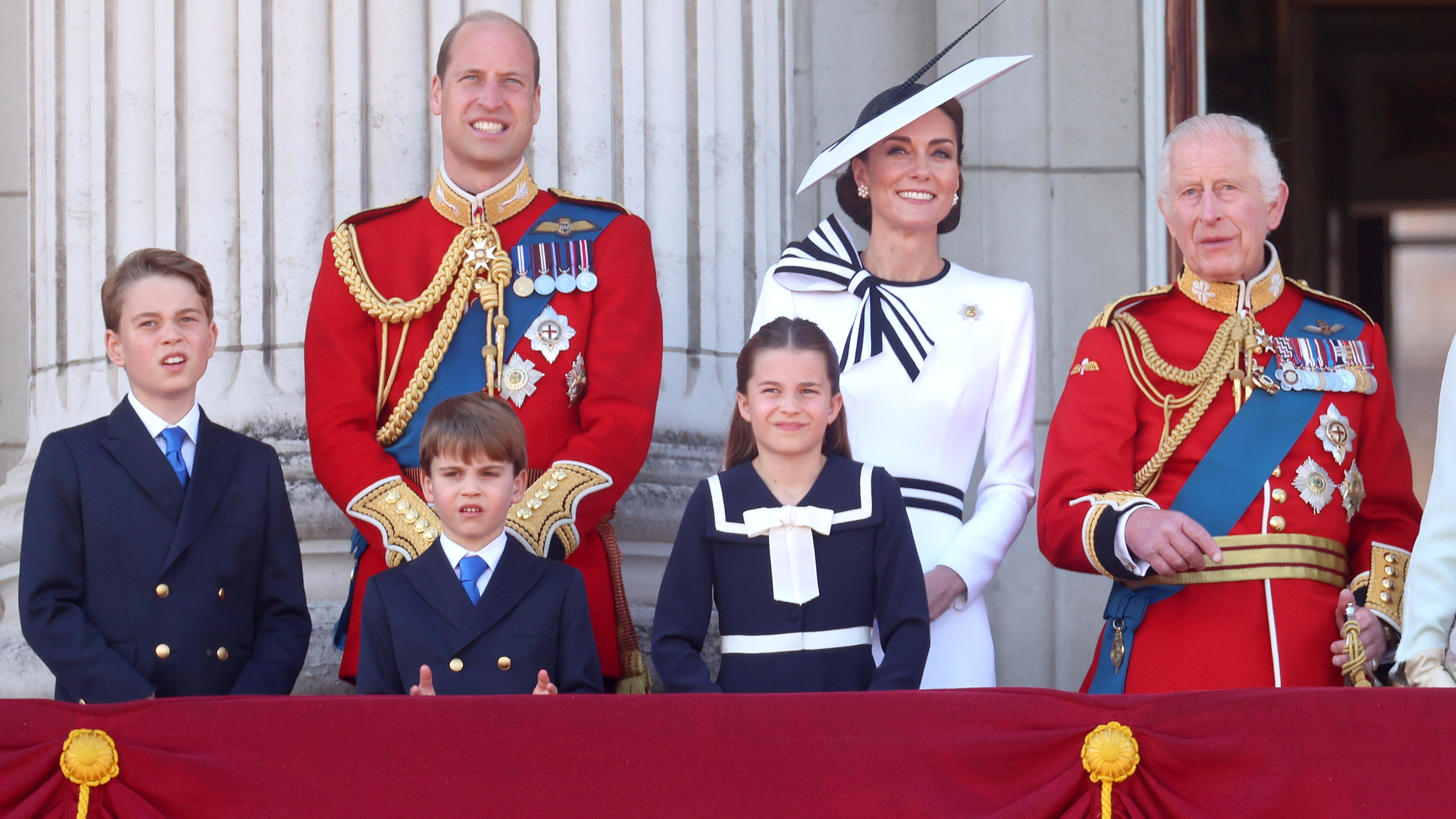 Prince George of Wales, Prince William, Prince of Wales, Prince Louis of Wales, Catherine, Princess of Wales, Princess Charlotte of Wales and King Charles III on the balcony during Trooping the Colour at Buckingham Palace on June 15, 2024