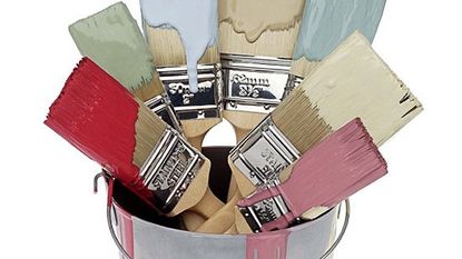 paint bucket with paint brushes