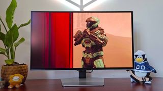 Samsung Odyssey OLED G6 monitor with Spartan on screen.