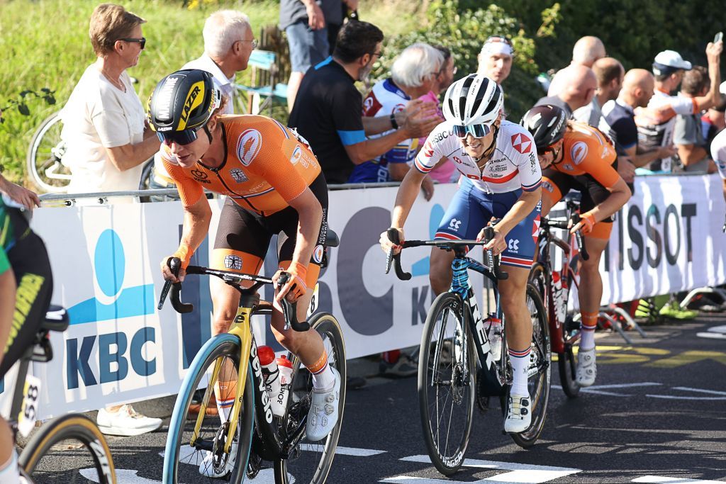 Britains Elizabeth Deignan R and Netherlands Marianne Vos L ride in the pack the womens elite cycling road race 1577km from Antwerp to Leuven on the seventh day of the Flanders 2021 UCI Road World Championships on September 25 2021 Photo by Kenzo Tribouillard AFP Photo by KENZO TRIBOUILLARDAFP via Getty Images