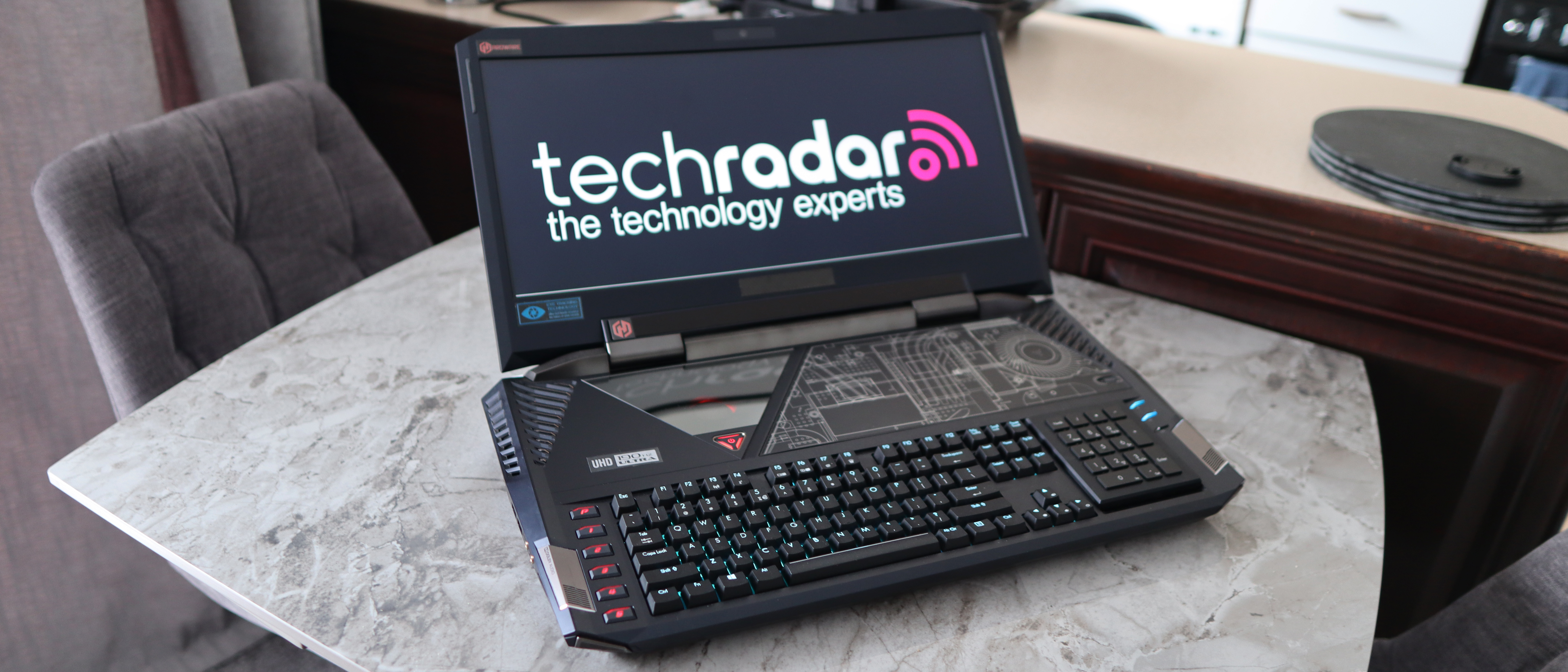 Acer Predator 21X gaming laptop on a marble table top