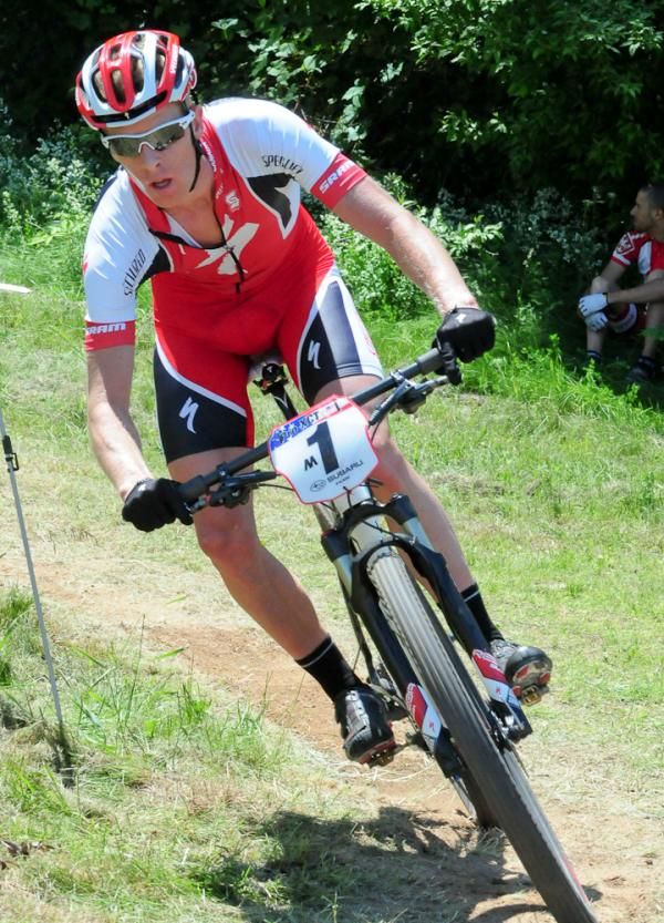 Max Plaxton (Specialized) chases Wells