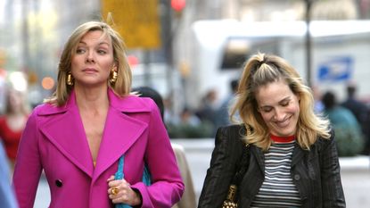 Kim Cattrall and Sarah Jessica Parker during Kim Cattrall and Sarah Jessica Parker On Location For "Sex And The City" at Saks Fifth Ave in New York, New York, United States. (Photo by James Devaney/WireImage)