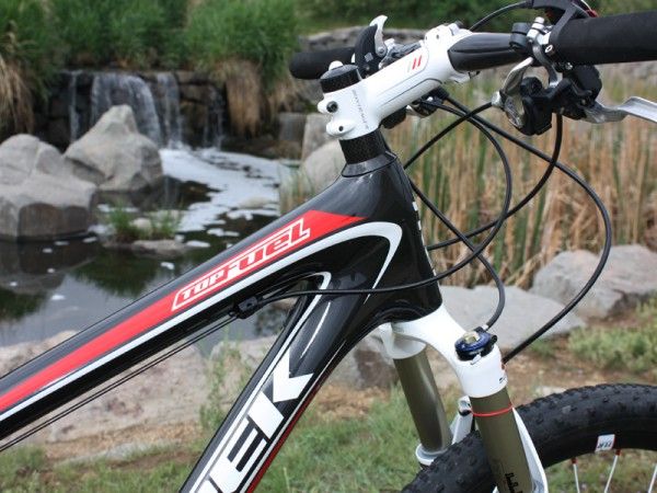 The top tube and down tube are both pushed right to the ends of the integrated head tube.