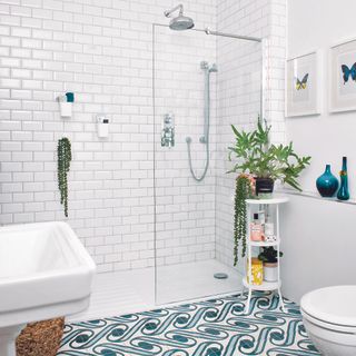 White bathroom with blue floor tiles