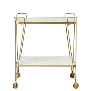 shay trolley with brass frame and wheels and marble