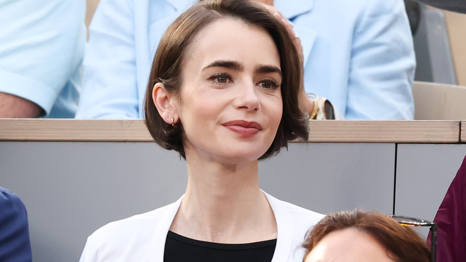 Lily Collins returned to the 2026 French Open in the jazz shoe trend