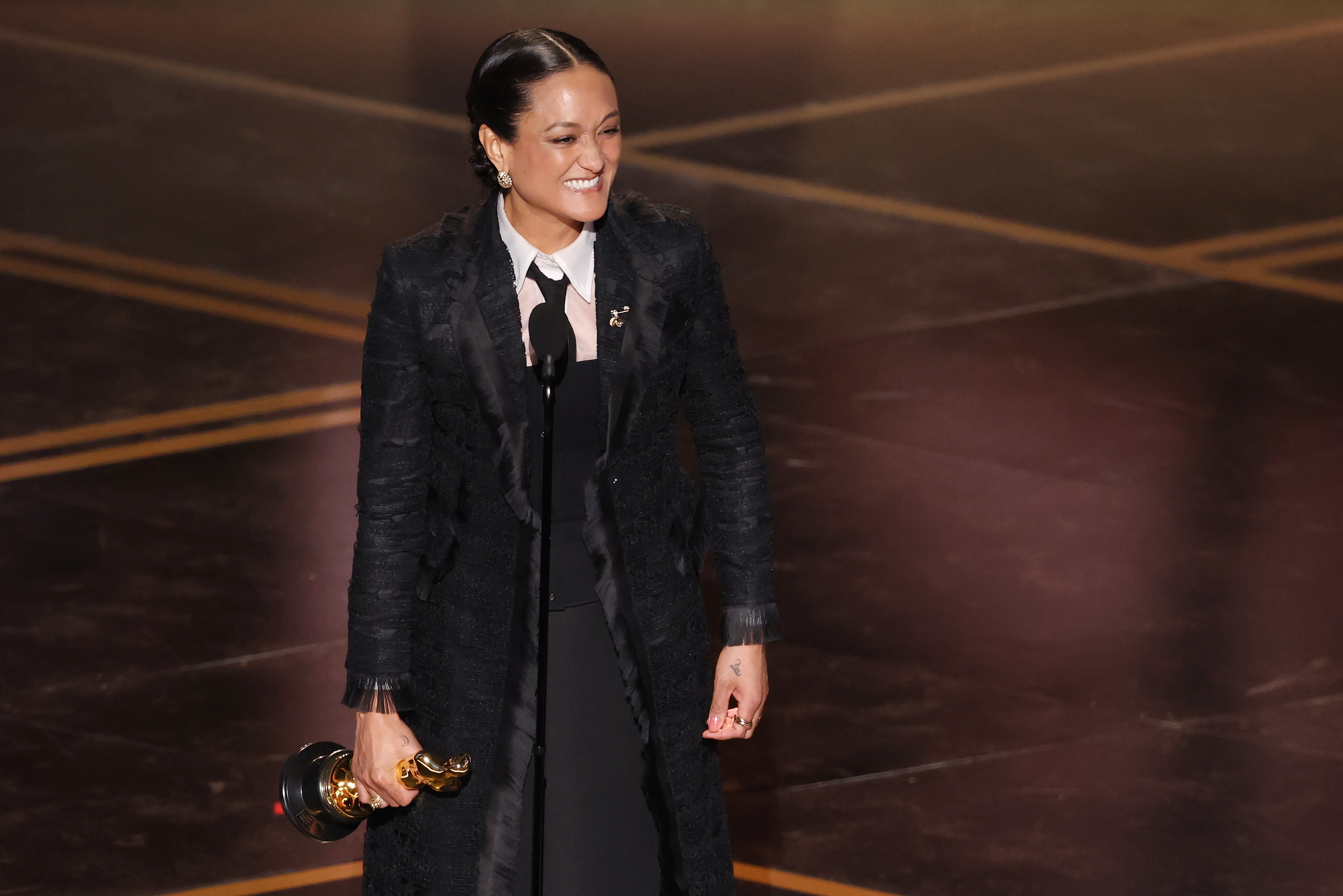 Autumn Durald Arkapaw smiles on stage as she accepts the Oscar for Best Cinematography for sinners during the 98th Annual Academy Awards held by the Academy of Motion Picture Arts and Sciences at the Dolby Theatre in Hollywood, CA, Sunday, March 15, 2026.