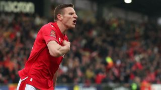 Paul Mullin of Wrexham celebrates after scoring a goal to make it 3-1 during the Vanarama National League match between Wrexham and Boreham Wood