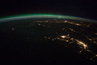 northern lights from space, aurora borealis from space, astronaut photographs, northern lights images, northern lights photographs, International Space Station