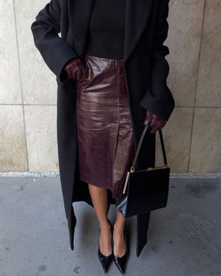 Winter outfit trends: @ingridedvinson wears a leather pencil skirt