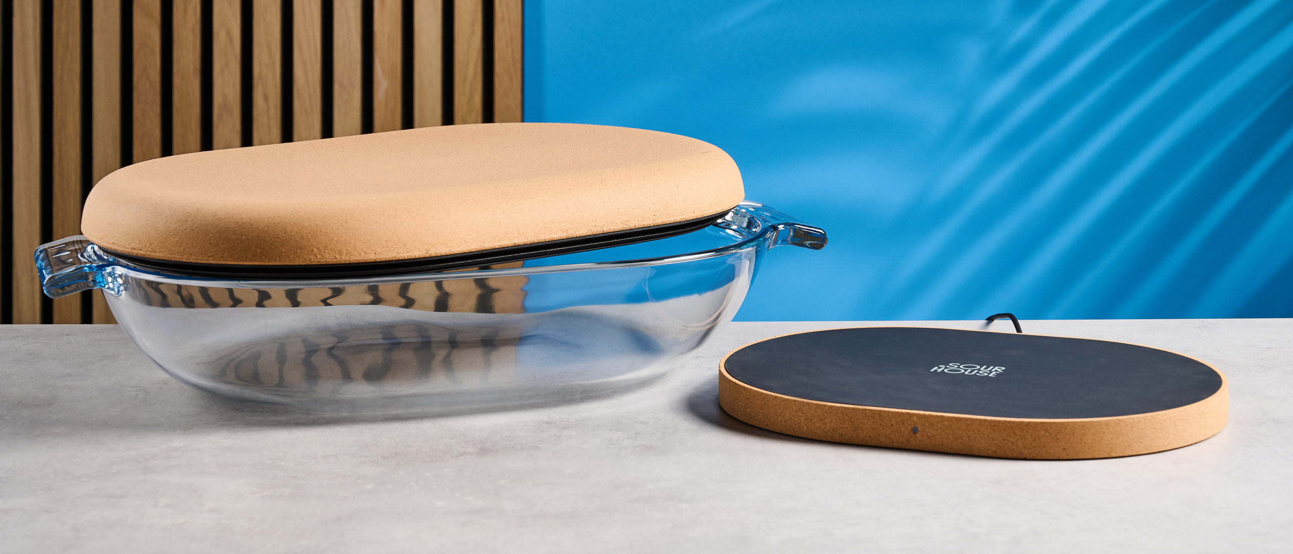 the Sourhouse DoughBed sourdough bulk fermentation proofing basket with a glass proofing bowl and an electric heating warming mat for even proofing
