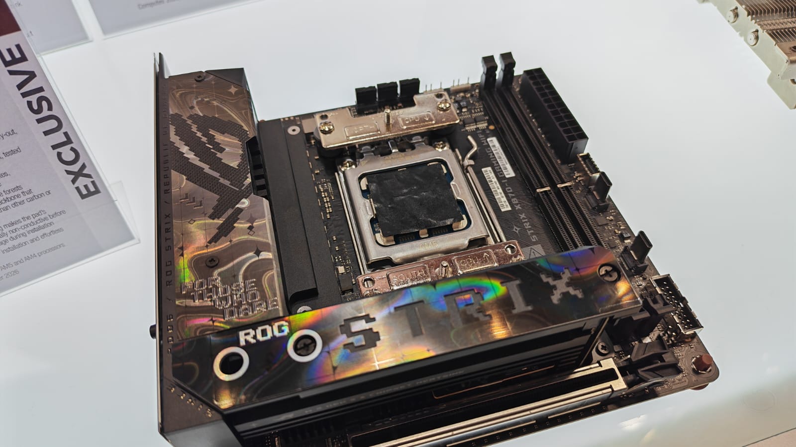 A gaming motherboard and CPU with a NT-CP1 Carbice Carbon Nanotube Thermal Pad on top of it
