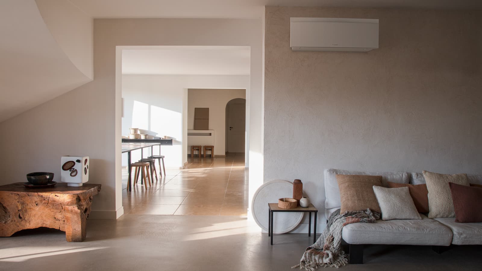 An air conditioning unit on a living room wall
