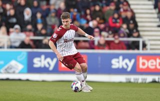 Sam Hoskins of Northampton Town in action during the Sky Bet League Two between Northampton Town and Gillingham at Sixfields on April 10, 2023 in Northampton, England.