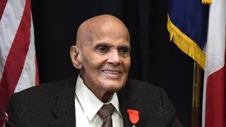 NEW YORK, NEW YORK - DECEMBER 16: (Exclusive Coverage) Harry Belafonte receives the National Order of the Legion of Honour, the highest award bestowed by the French government, from Ambassador of France to the United States Phillipe Etienne at a Private Residence on December 16, 2021 in New York City. 
