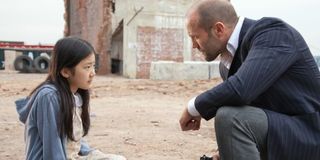 Catherine Chan and Jason Statham in Extraction