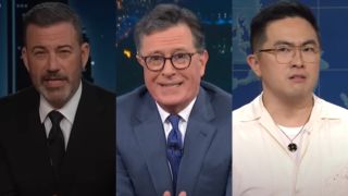 Jimmy Kimmel, Stephen Colbert and Bowen Yang, all sitting at desks and facing the camera with confused looks.