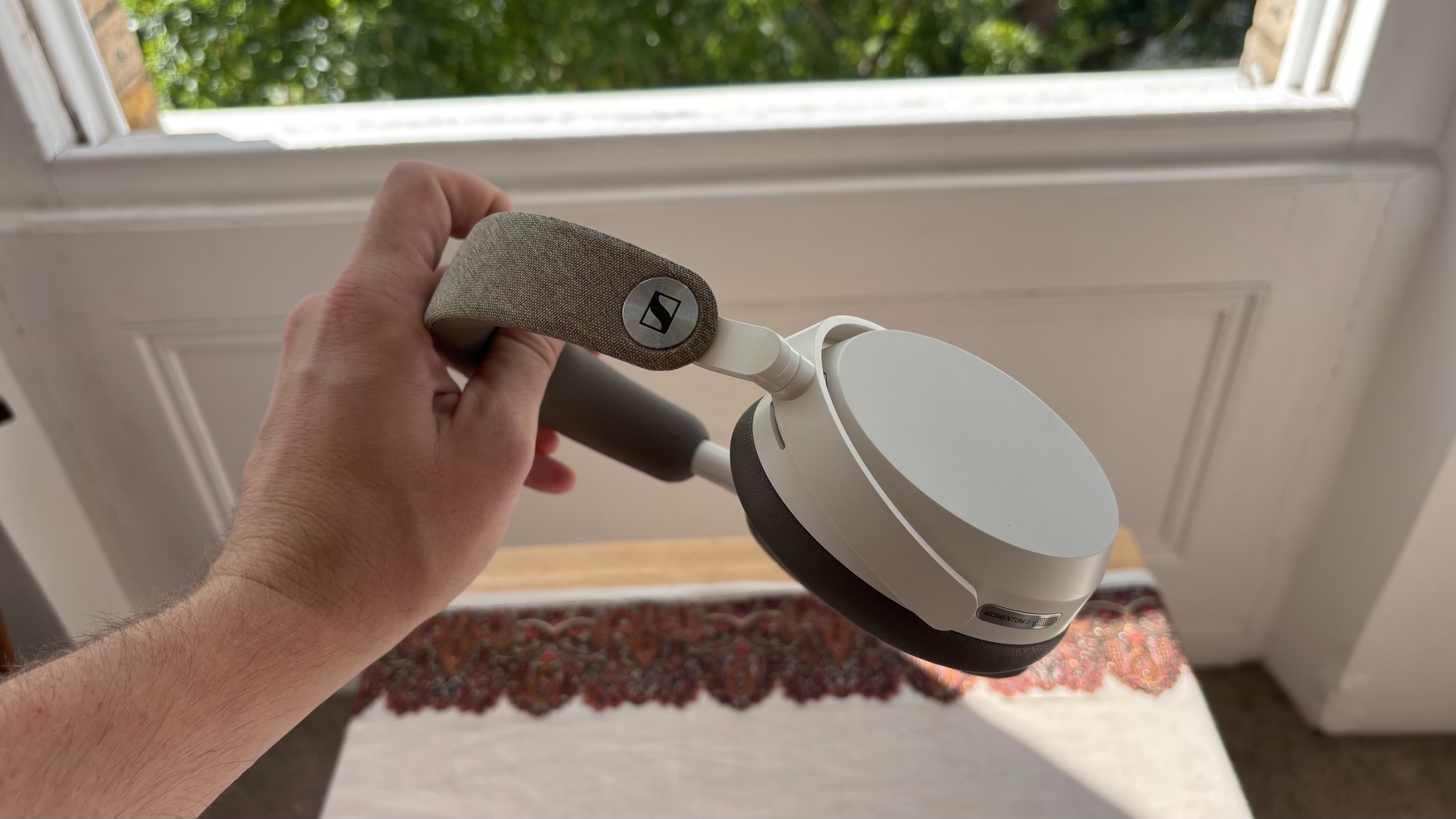 Sennheiser Momentum 5 Wireless in hand