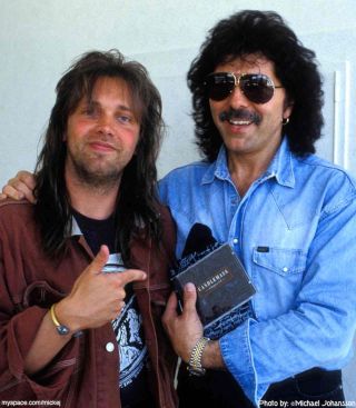 Candlemass’s Leif Edling with Black Sabbath‘s Tony Iommi in 1992