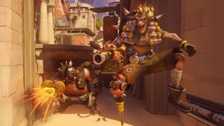 Junkrat jumping into action followed by Roadhog