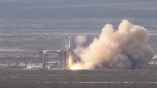 rocket launching above a desert