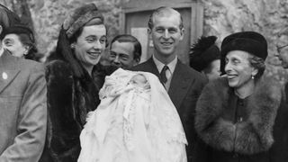 Lieutenant Mountbatten, the fiancé of Princess Elizabeth, attends the christening of Norton Knatchbull