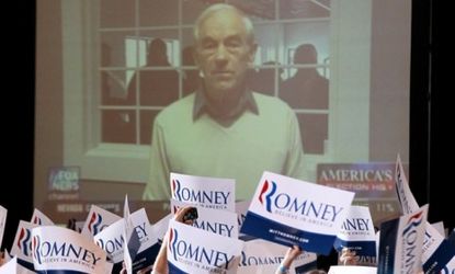 Ron Paul is seen on a television screen during a caucus night party for Nevada winner Mitt Romney: Paul finished in third place, behind Romney and Newt Gingrich.