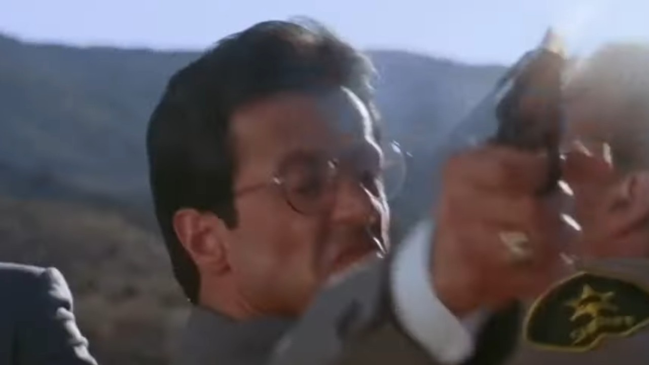 Sylvester Stallone firing a gun in Tango &amp;amp; Cash